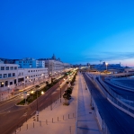 France, Bouches du Rhone (13), Marseille, 2e arrondissement, Zone Euromediterranee, quartier La Joliette, boulevard Euromediterranee, ancien siege de la Societe Nationale Corse Mediterranee (SNCM), Cathedrale La Major (XIXe siecle) classe Monument Historique en arriere plan